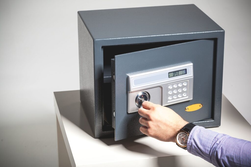 hand opened a safe, close up